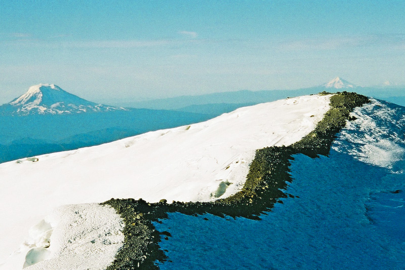 Crater Rim Of Mount Rainier With Mount Adams, Mount Hood And Mount Jefferson In The Distance